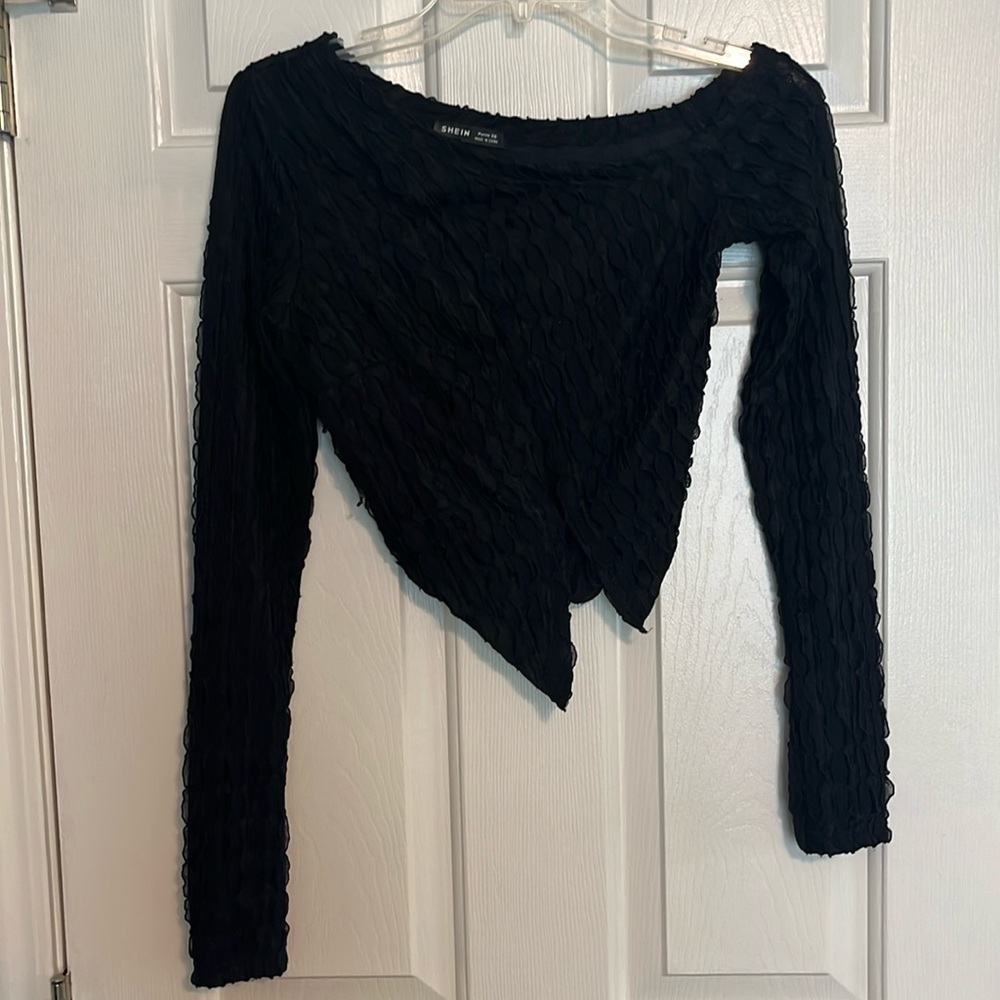 Cute asymmetrical top with peekaboo cutouts